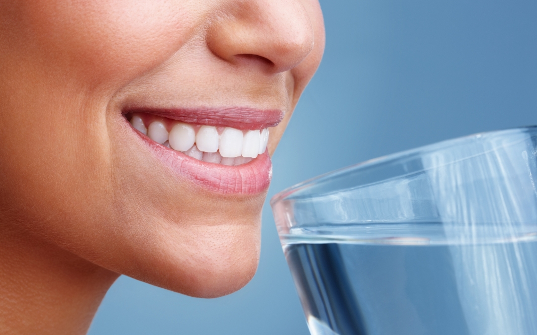 What Role Does Water Intake Play in Supporting Oral Health?